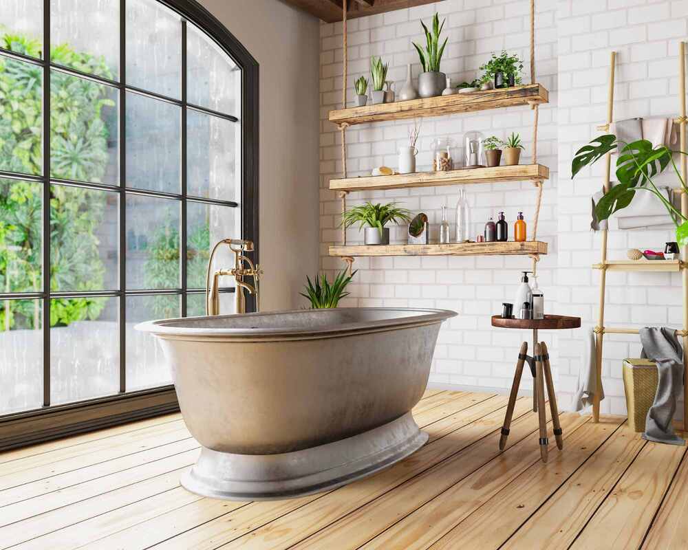 Before Party Cleaning Tips for the Bathroom (Image of a bathroom with a wooden floor, bath, and lots of plants)
