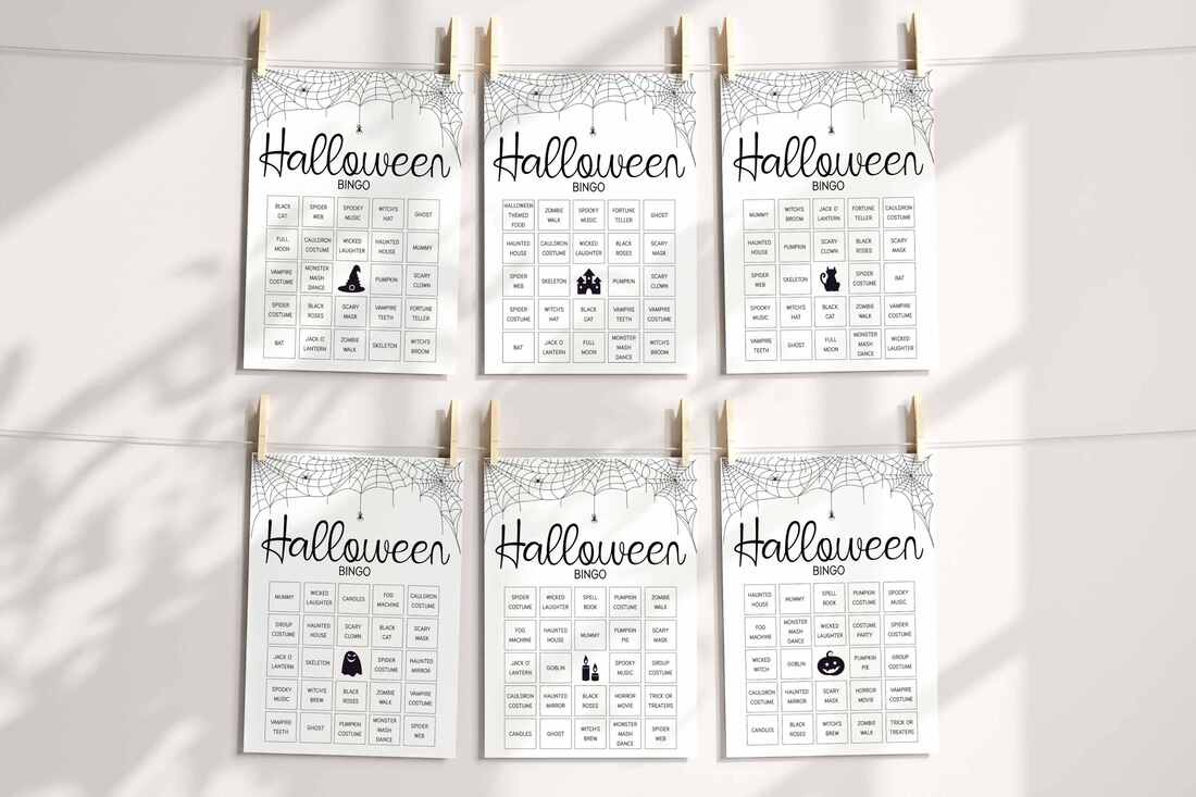 6 Halloween bingo cards pegged to a piece of white string